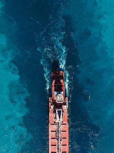 bluewater bridge bird's-eye view photography of boat on dock port huron